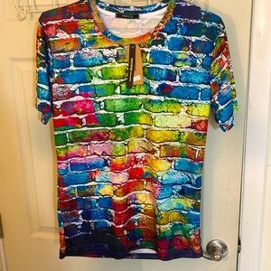 Polyester multi color tee. Brick wall pattern.